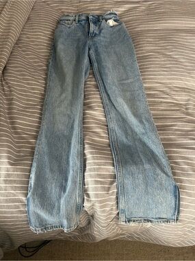 Abercrombie Women's High Rise Boot-Cut side slit hem Jeans, lightly distressed